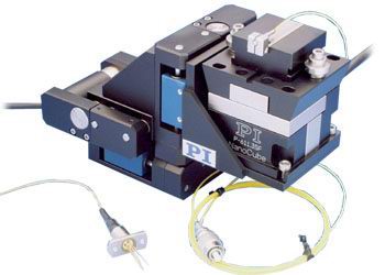 Combination of a Motorized Servo Positioner (XYZ stage) and a piezo three-axis stage for long travel with nanometer precision 